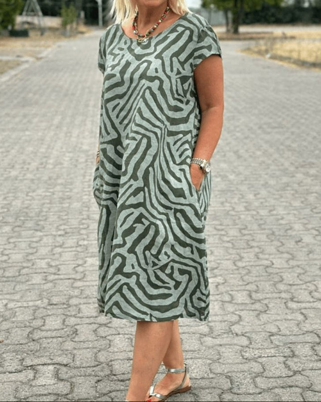 Solina™ – Kleid mit Rundhalsausschnitt und wunderschönem, bauchbedeckendem Print
