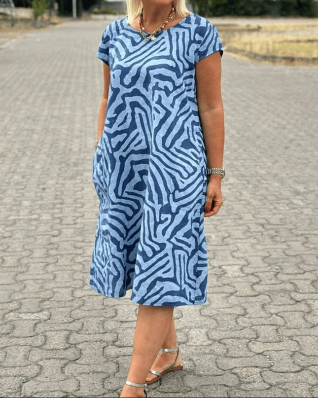 Solina™ – Kleid mit Rundhalsausschnitt und wunderschönem, bauchbedeckendem Print