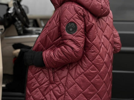 Clara – Gesteppter Mantel mit Kapuze für perfekte Wärme und Eleganz im Winter
