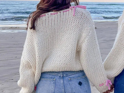 Bea | One Shoulder Chunky Knit Pullover mit rosa Kontrastband Schleife Akzente