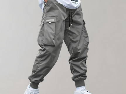 Sommerfeld™ | Herren Cargo Jogginghose – Lila Streetwear-Hose mit Reißverschlusstaschen & Bündchen