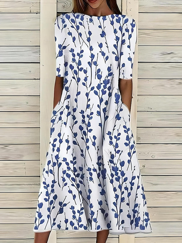 Sela™ – Sommerliches Midikleid mit elegantem Blumenprint
